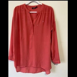 Red orange flowy blouse